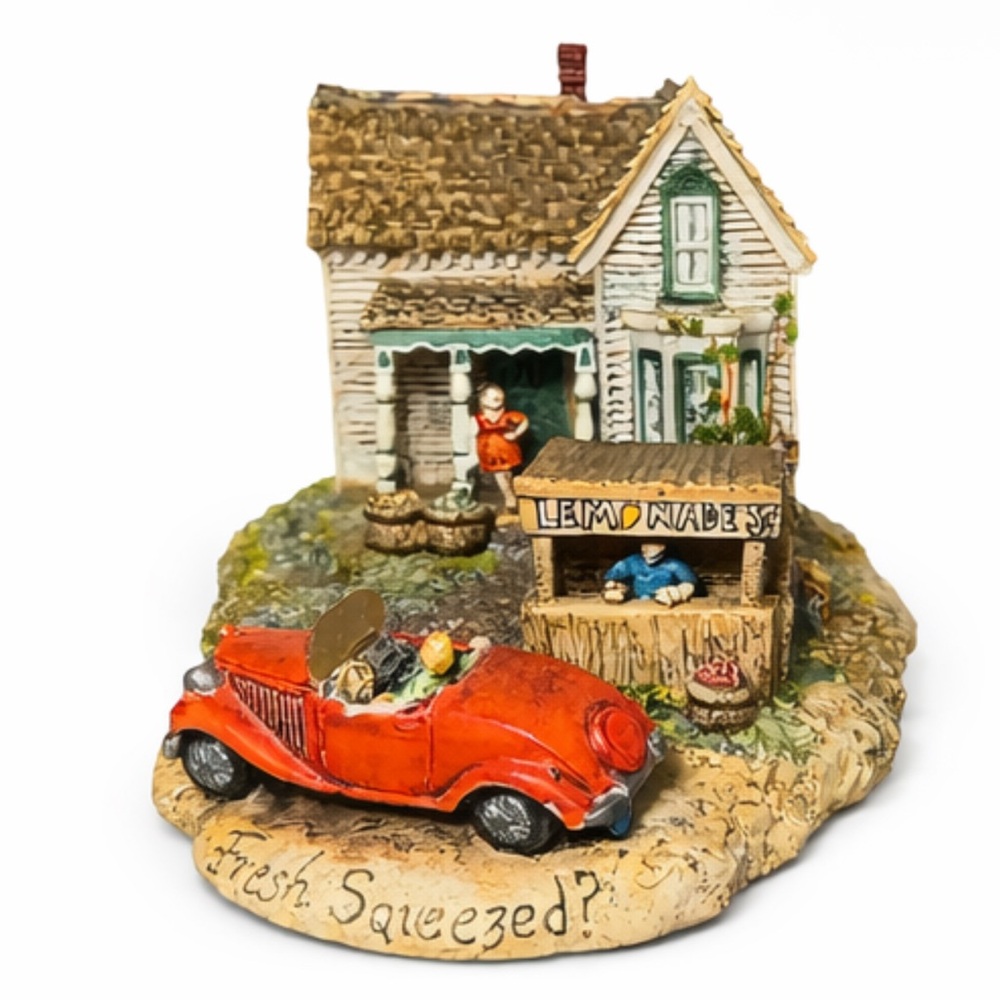 Charming Miniature House with Red Car